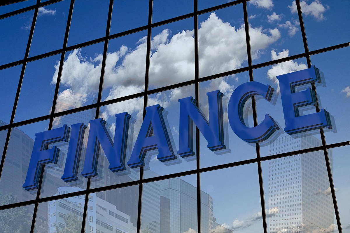 Stock exchange floor with traders and trading posts