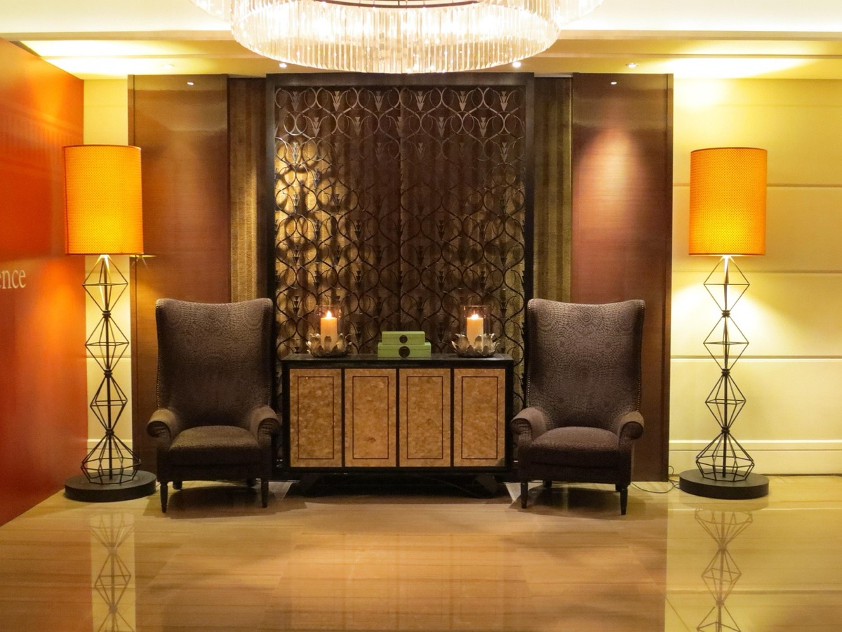 Hotel lobby with marble floor and chandelier