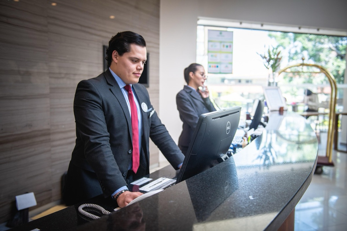 Hotel lobby with reception desk in Hong Kong